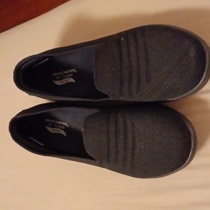 Black skechers arch fit slip on shoes